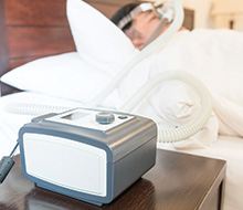 Patient with CPAP system sleeping soundly