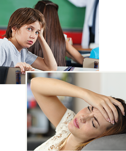 Child tired in class and woman holding her head