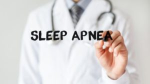 Doctor writing the phrase, "Sleep Apnea"